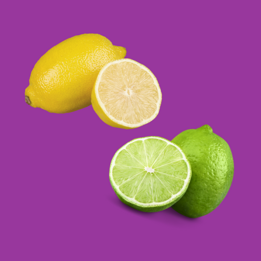 A picture of a lemon and a lime on a purple background, representing Hypothermias Pure Cane Sugar Lemon Lime Dye-FREE Slush Syrup.